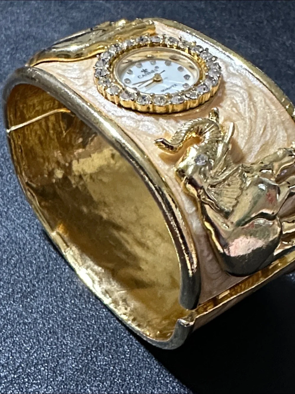 Cannes Gold Tone Elephant Hinged Enamel Clamper Bracelet Watch